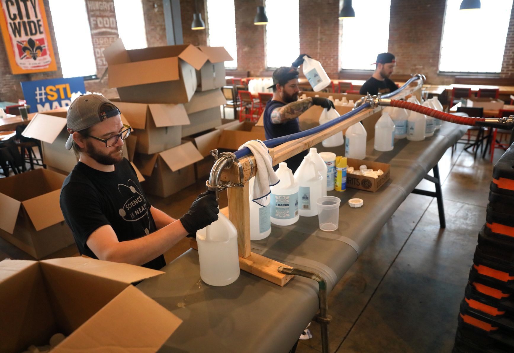 4 Hands Brewing packages hand sanitizer
